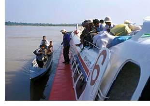 small ferry boat on the Mekong