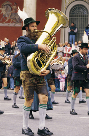 horn player in Costume and Riflemen's Parade
