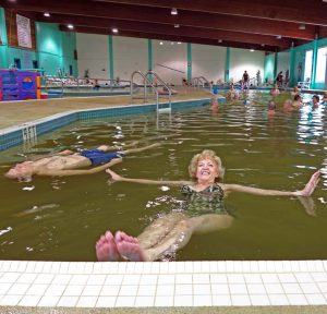 The author floating in Manitou springs resort pool